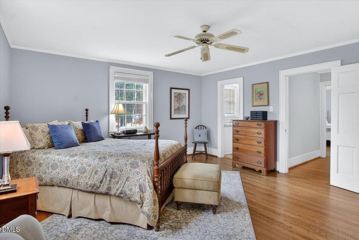 2064 Oxford Road Henderson, NC 27536 - Photo 45 of 68 a bedroom with a bed and furniture