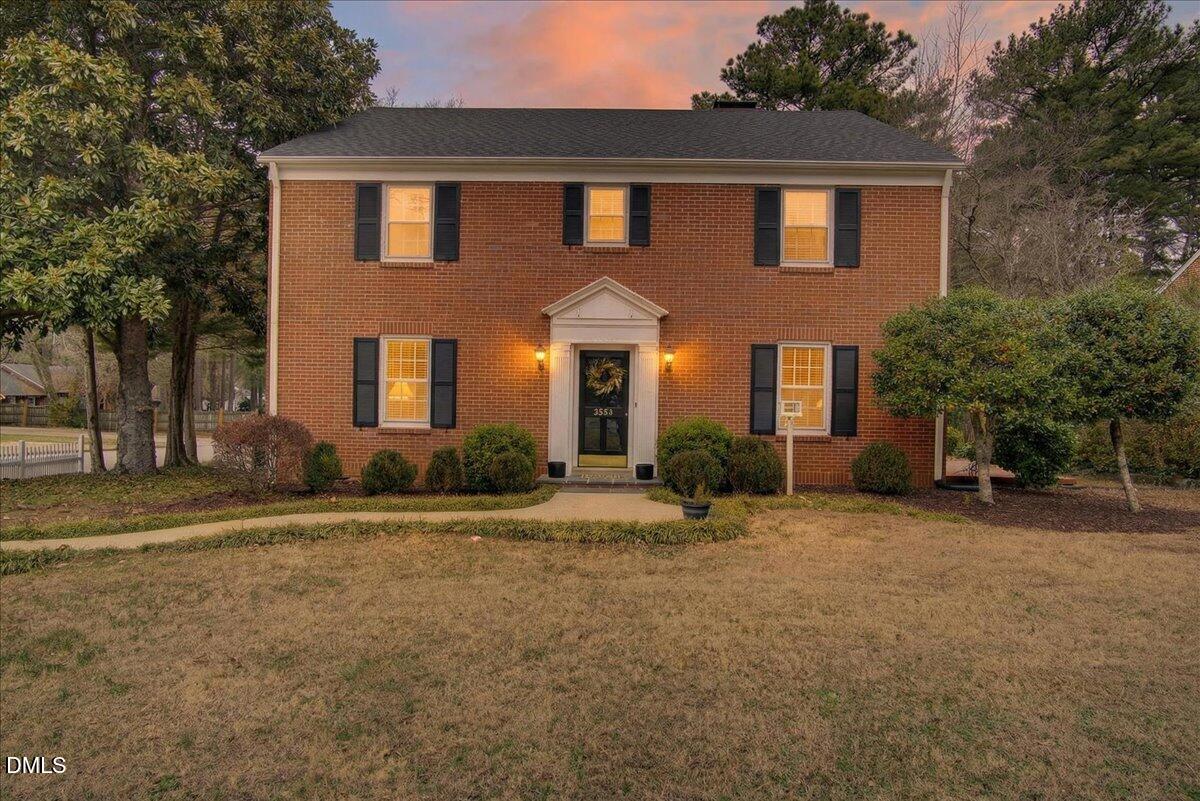 2064 Oxford Road Henderson, NC 27536 - Photo 59 of 68 a front view of a house with a yard