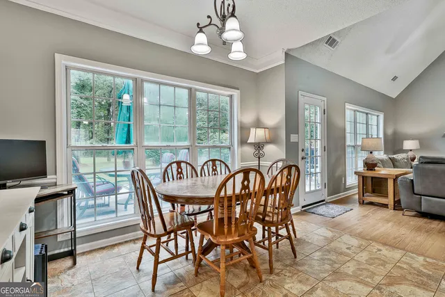 a spacious bathroom with a double vanity sink a and mirror
