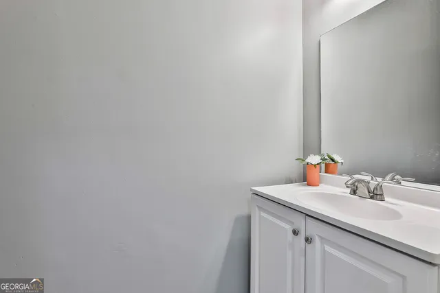 a view of a backyard with sitting area