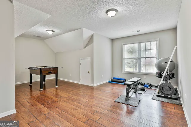 a front view of house with garden