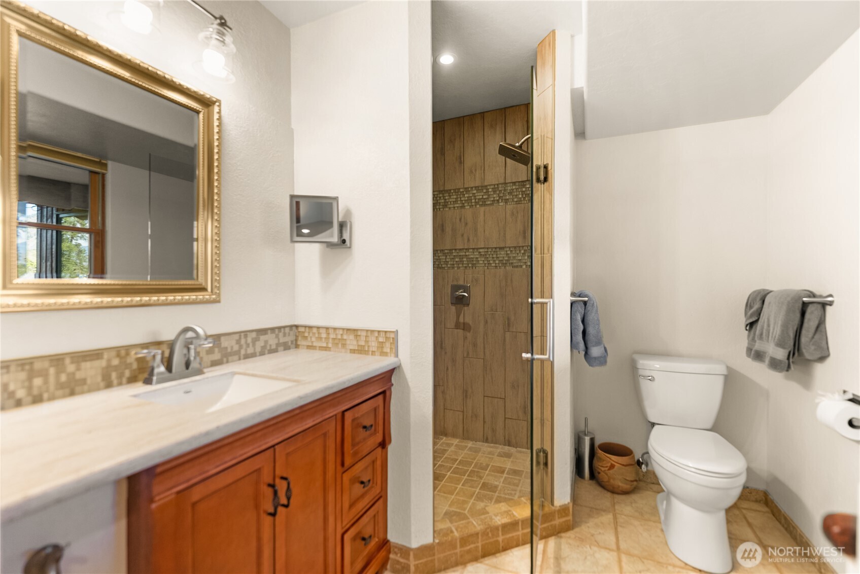 2621 Highway 153 Twisp, WA 98856 - Photo 12 of 40 a bathroom with a sink toilet and shower