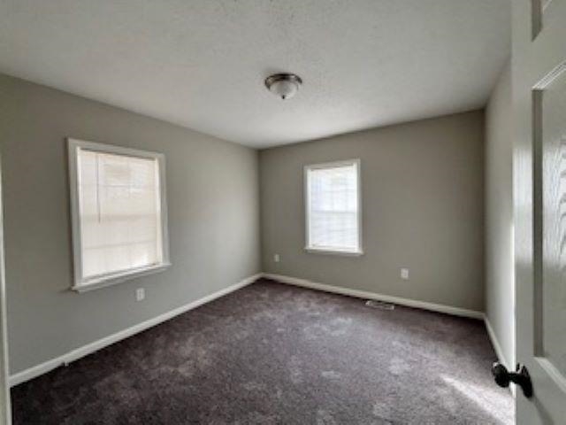 2060 Riverside Boulevard Memphis, TN 38109 - Photo 11 of 13 an empty room with a window