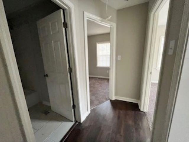 2060 Riverside Boulevard Memphis, TN 38109 - Photo 13 of 13 an empty room with wooden floor and a sink