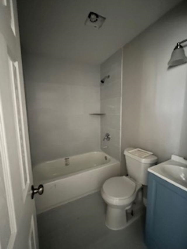 2060 Riverside Boulevard Memphis, TN 38109 - Photo 7 of 13 a white toilet sitting next to a bath tub