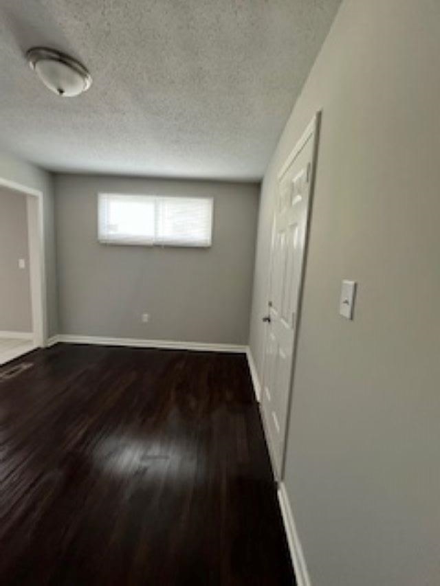 2060 Riverside Boulevard Memphis, TN 38109 - Photo 8 of 13 an empty room with wooden floor