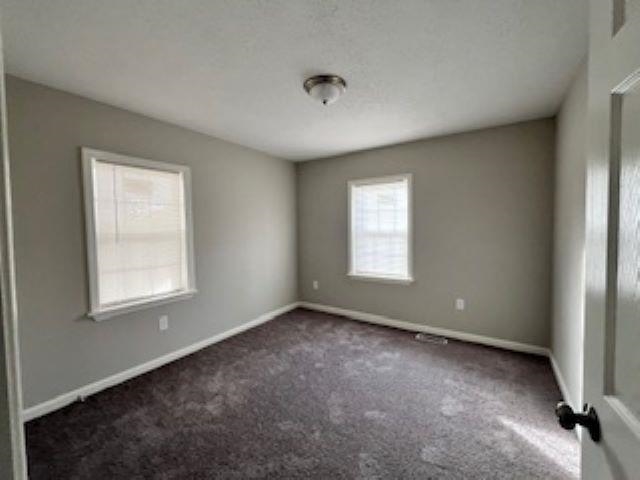 2060 Riverside Boulevard Memphis, TN 38109 - Photo 10 of 13 an empty room with windows