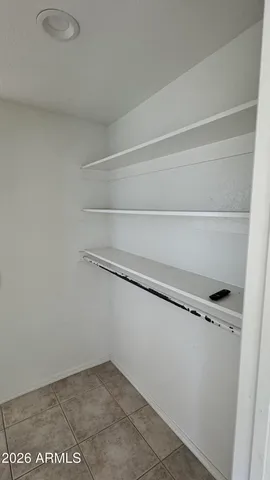 a view of a room with racks on the wall