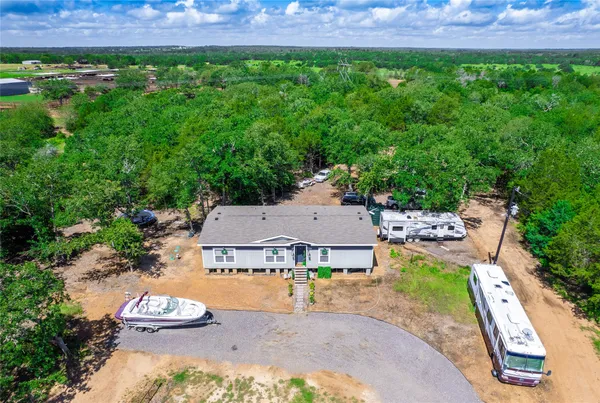 $399,999 | 1686 Farm To Market Road 2104, Paige, TX 78659