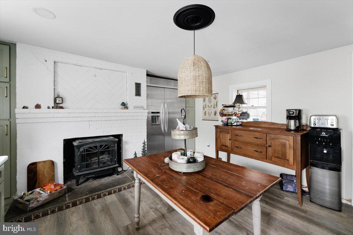 4781 Scrabble Road Shepherdstown, WV 25443 - Photo 20 of 61 a living room with furniture and a fireplace