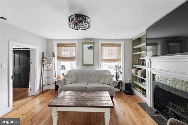 a view of a dining room with furniture and window