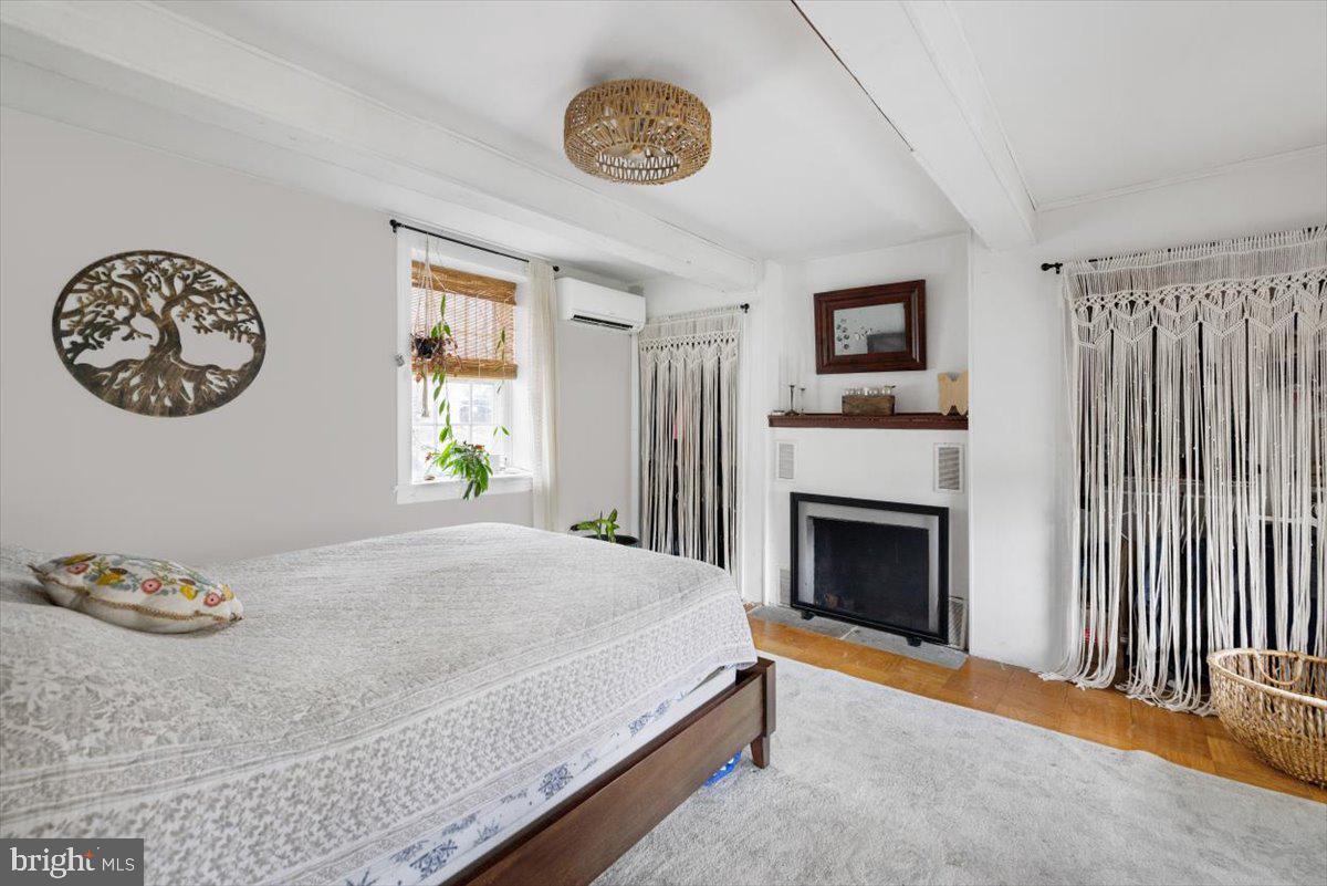 4781 Scrabble Road Shepherdstown, WV 25443 - Photo 24 of 61 a bedroom with a bed and a table