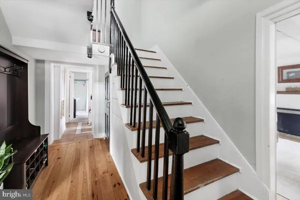a bathroom with a sink a washer and dryer