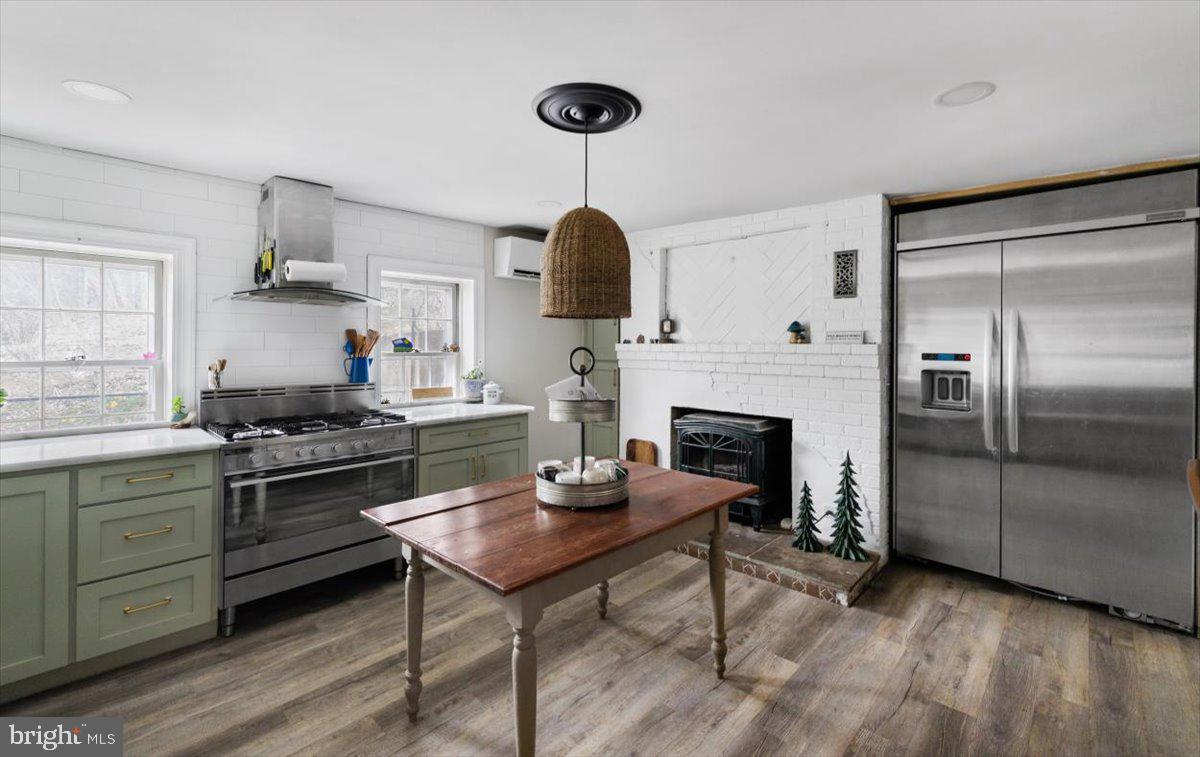 4781 Scrabble Road Shepherdstown, WV 25443 - Photo 28 of 61 a kitchen with furniture and a fireplace
