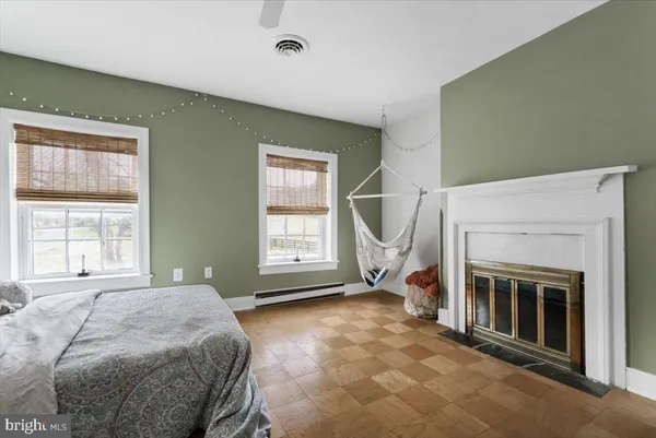 a view of a house with snow on the side of the house