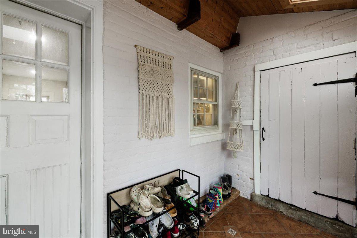 4781 Scrabble Road Shepherdstown, WV 25443 - Photo 37 of 61 a view of a garage with rack on the wall