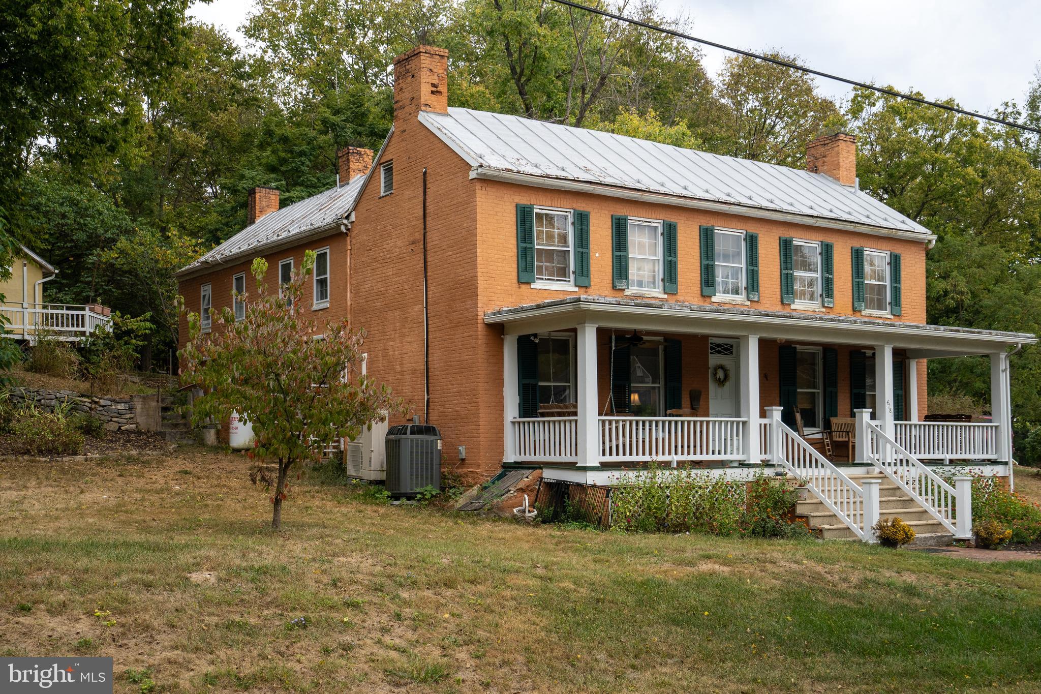 4781 Scrabble Road Shepherdstown, WV 25443 - Photo 53 of 61 a front view of a house with a yard