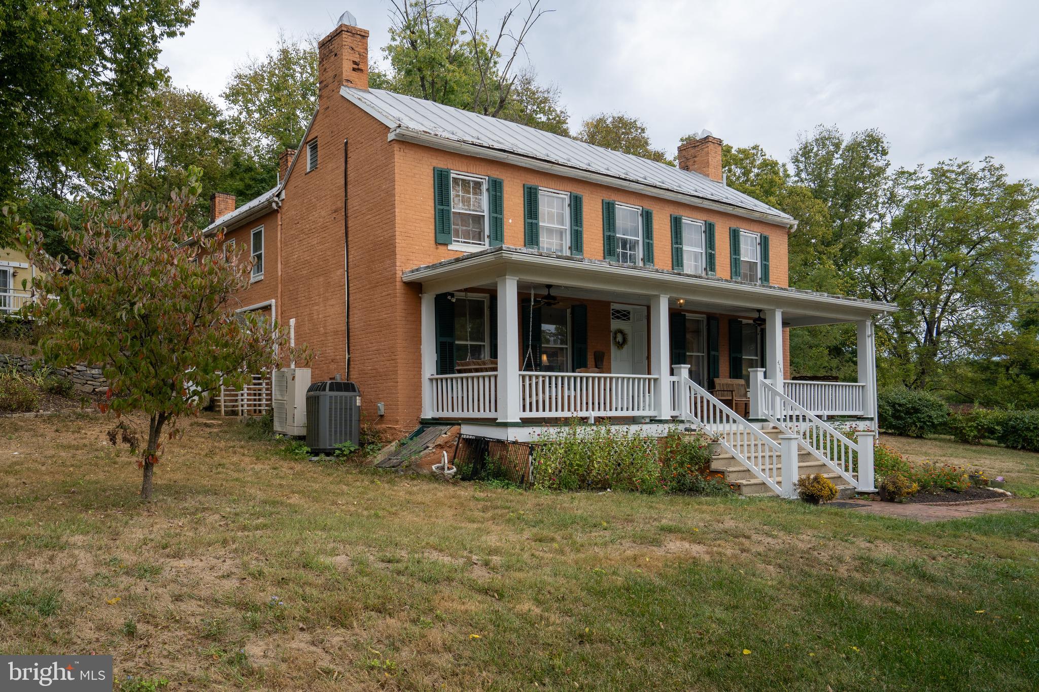 4781 Scrabble Road Shepherdstown, WV 25443 - Photo 54 of 61 a front view of a house with a yard