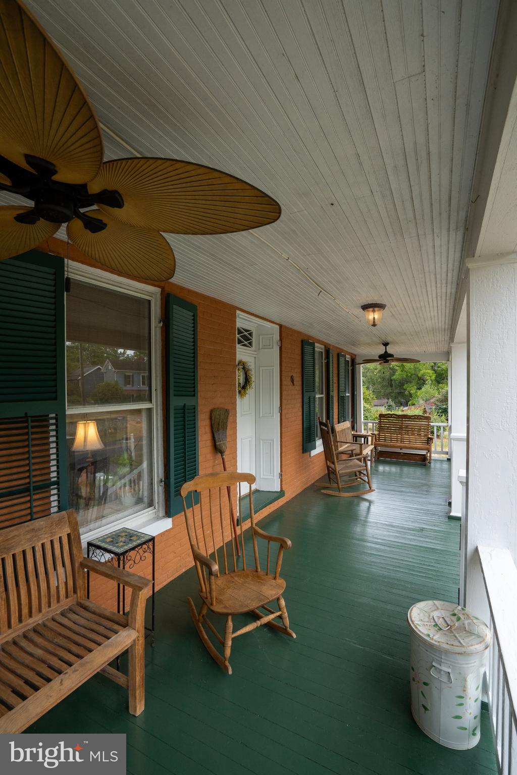 4781 Scrabble Road Shepherdstown, WV 25443 - Photo 10 of 61 a building outdoor space with patio furniture and potted plants