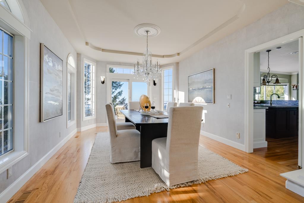 25220 Quail Ridge Road Los Gatos, CA 95033 - Photo 16 of 94 a view of a dining room with furniture window and wooden floor