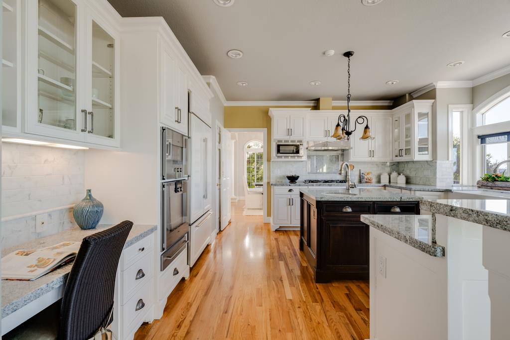 25220 Quail Ridge Road Los Gatos, CA 95033 - Photo 20 of 94 a kitchen with granite countertop a sink appliances cabinets and furniture