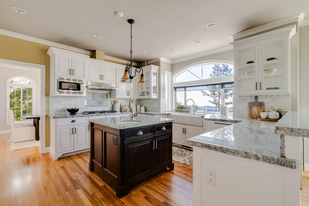 25220 Quail Ridge Road Los Gatos, CA 95033 - Photo 26 of 94 a kitchen with stainless steel appliances granite countertop a sink stove and refrigerator