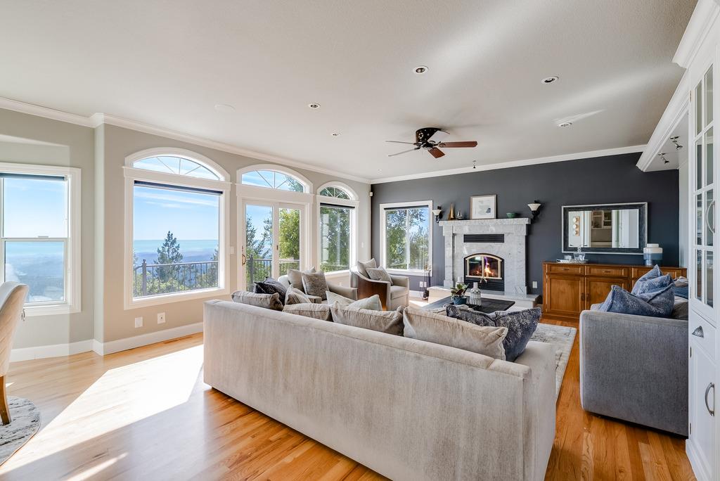 25220 Quail Ridge Road Los Gatos, CA 95033 - Photo 35 of 94 a living room with fireplace furniture and a large window