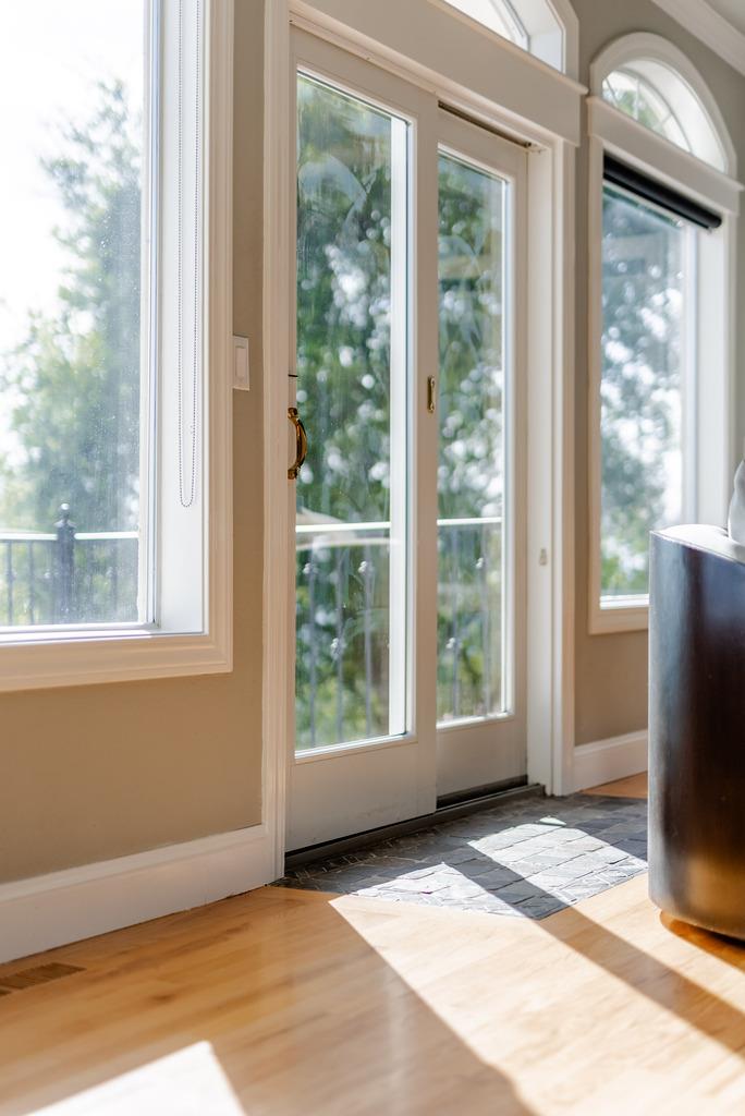 25220 Quail Ridge Road Los Gatos, CA 95033 - Photo 36 of 94 a view of an empty room with a window and a fireplace