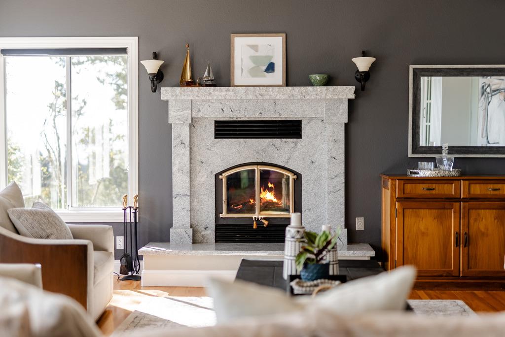 25220 Quail Ridge Road Los Gatos, CA 95033 - Photo 43 of 94 a living room with furniture and a fireplace