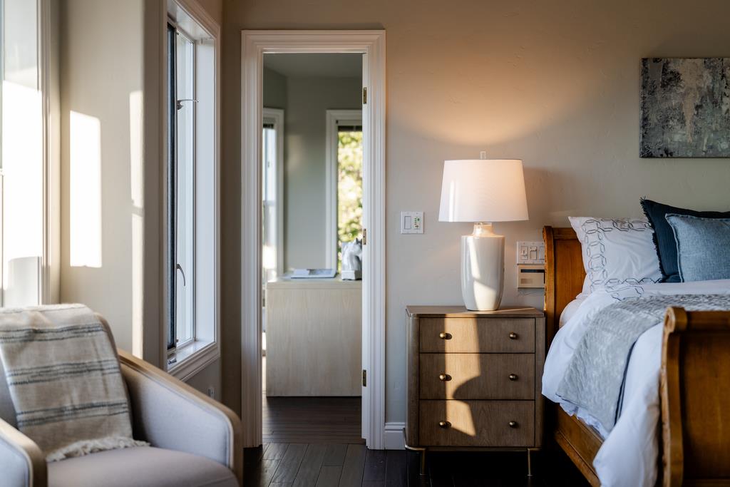 25220 Quail Ridge Road Los Gatos, CA 95033 - Photo 65 of 94 a living room with furniture and a lamp