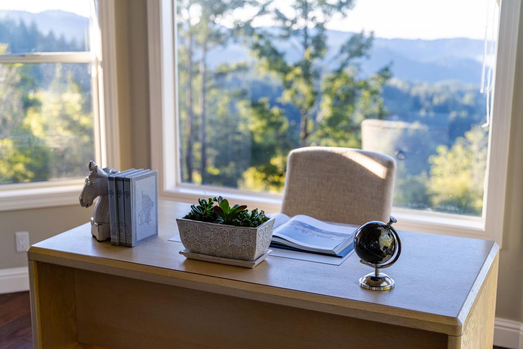 25220 Quail Ridge Road Los Gatos, CA 95033 - Photo 67 of 94 a view of a vase of flowers sitting on a table