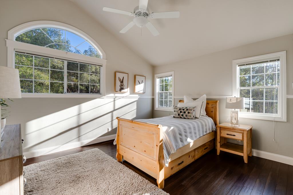 25220 Quail Ridge Road Los Gatos, CA 95033 - Photo 74 of 94 a bed room with a bed and a large window