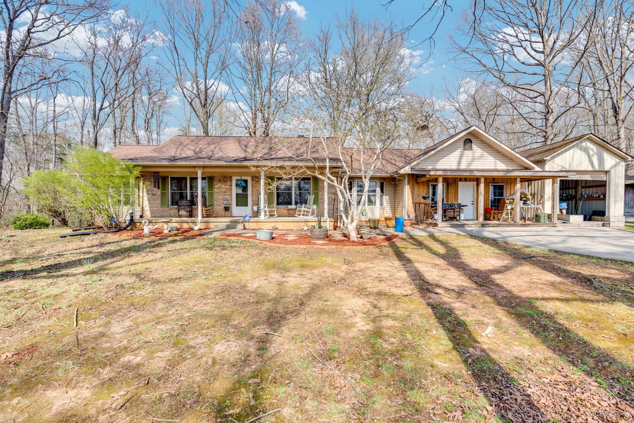 139 Bilbrey Road Livingston, TN 38570 - Photo 1 of 35 a front view of a building with a yard