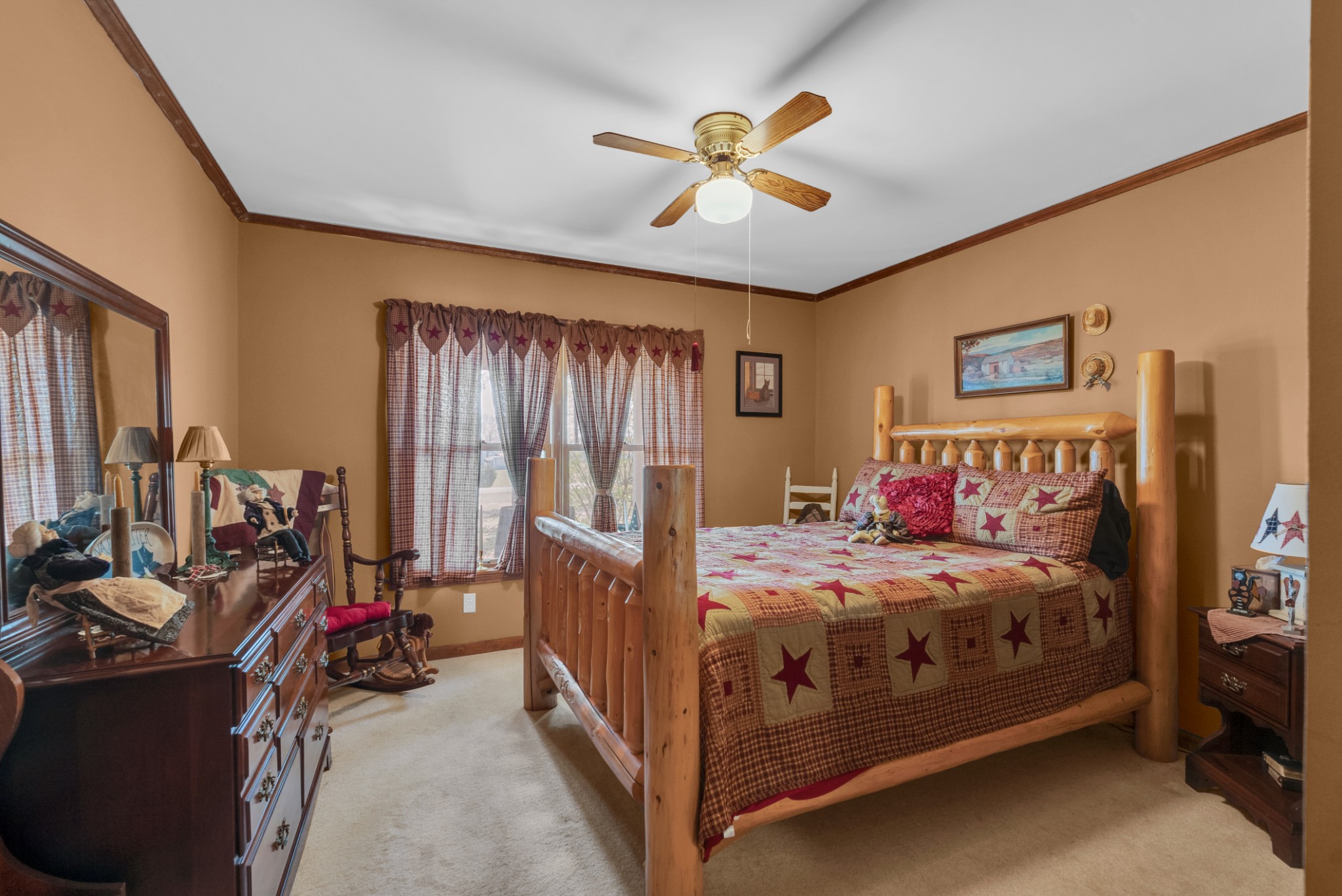139 Bilbrey Road Livingston, TN 38570 - Photo 16 of 35 a bed room with a bed and a ceiling fan