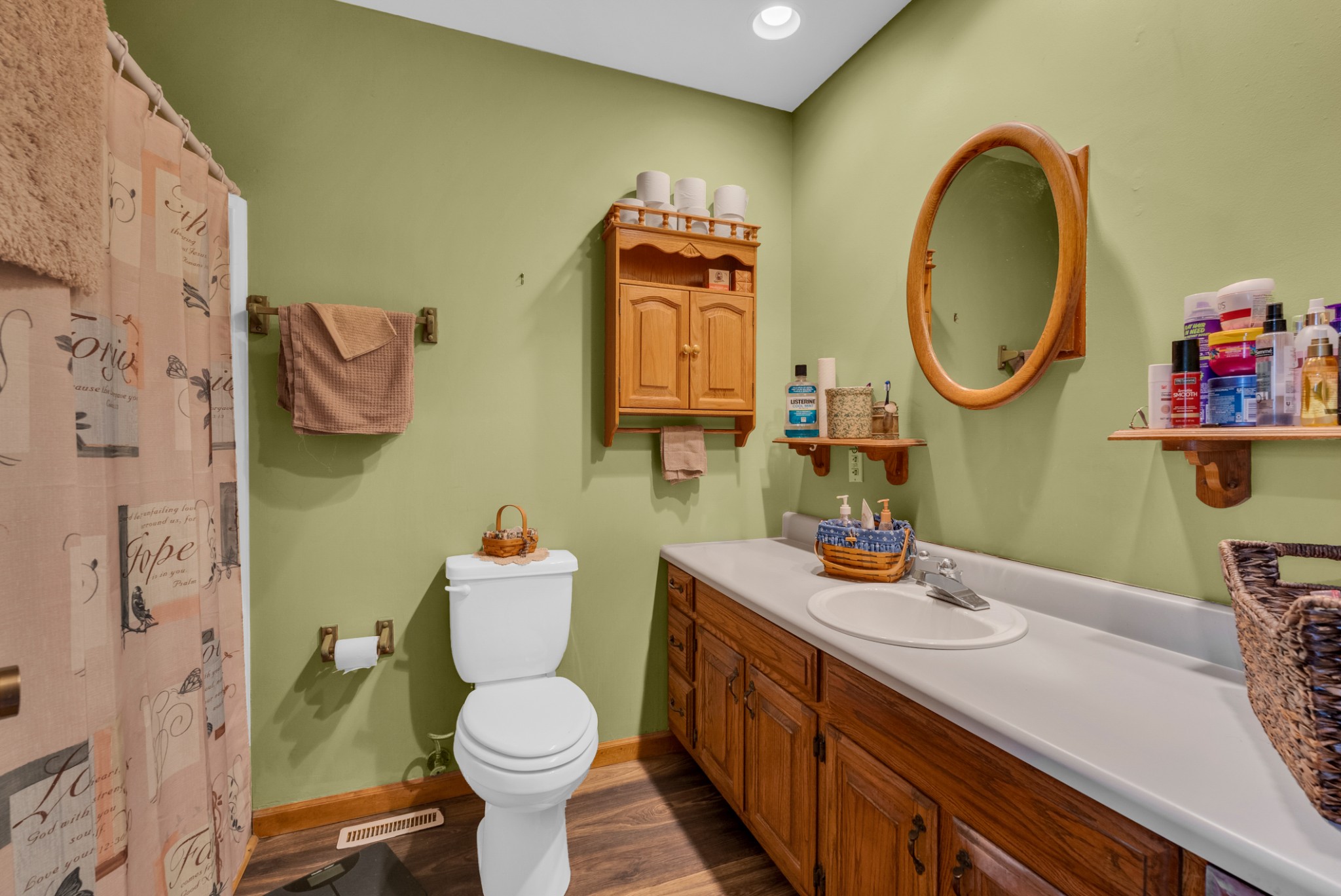 139 Bilbrey Road Livingston, TN 38570 - Photo 23 of 35 a bathroom with a toilet sink and mirror