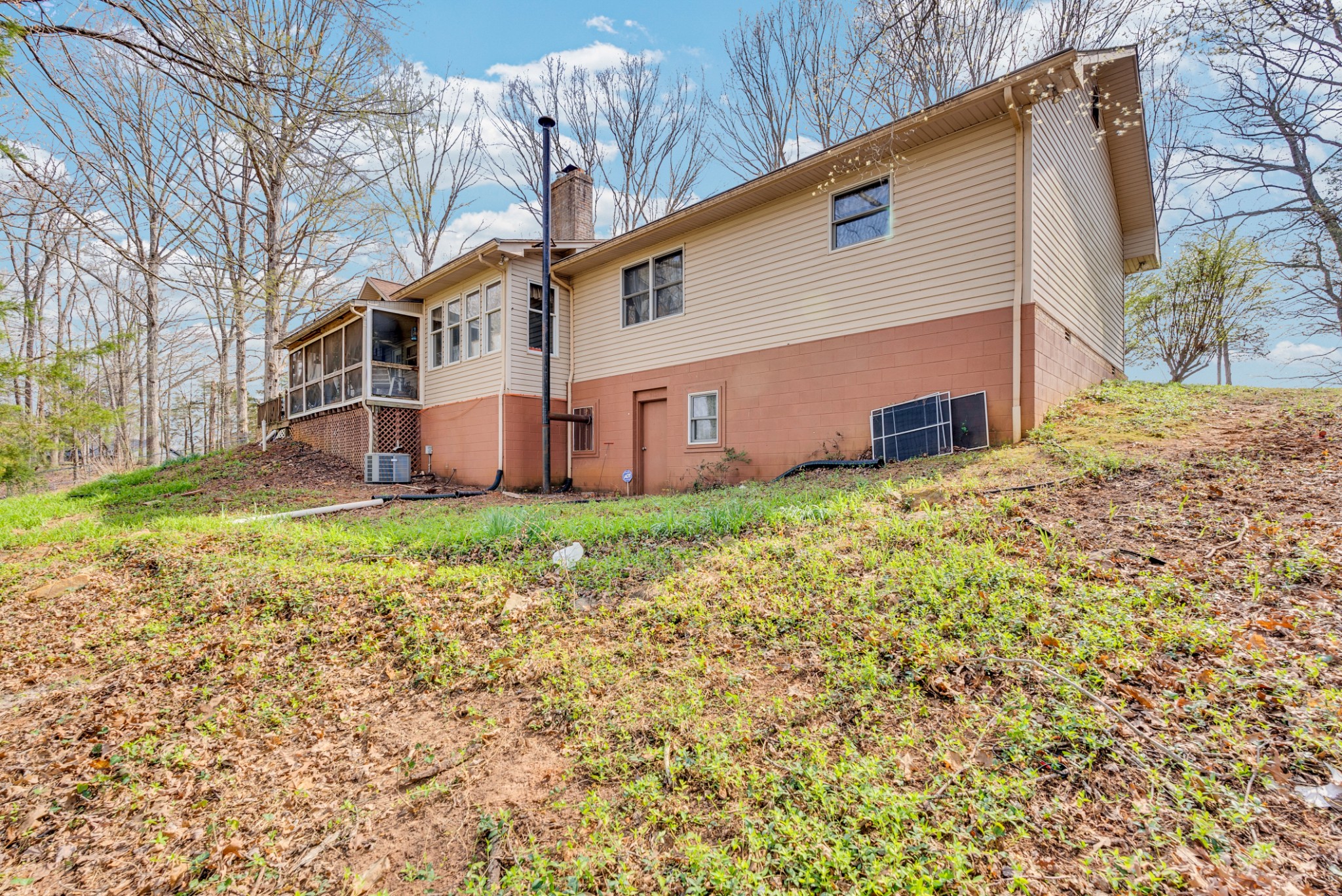 139 Bilbrey Road Livingston, TN 38570 - Photo 30 of 35 a view of a house with a yard