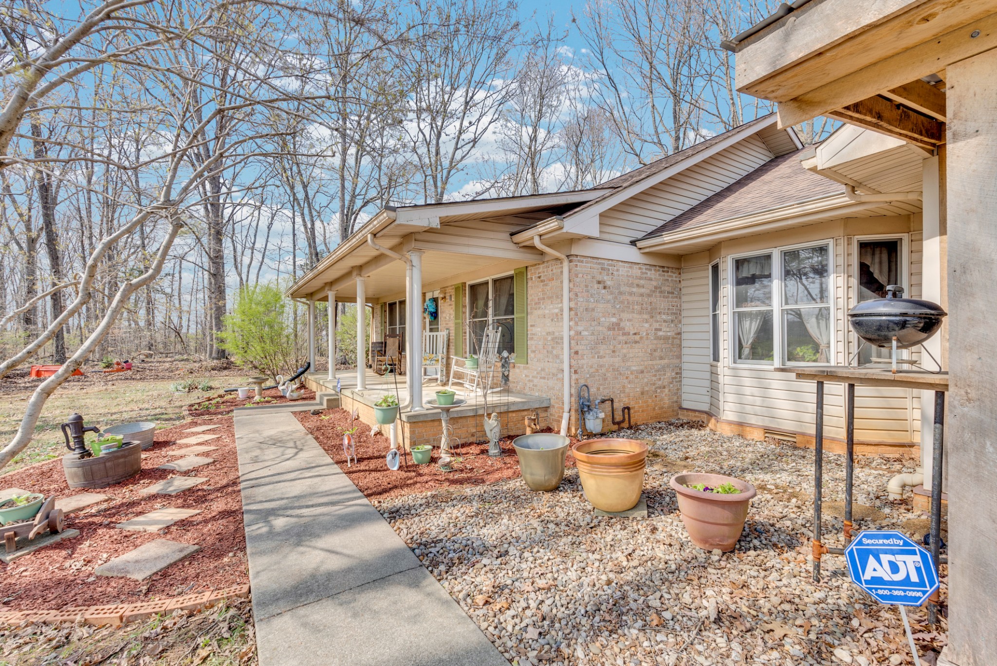 139 Bilbrey Road Livingston, TN 38570 - Photo 32 of 35 a view of a patio with chairs and potted plants