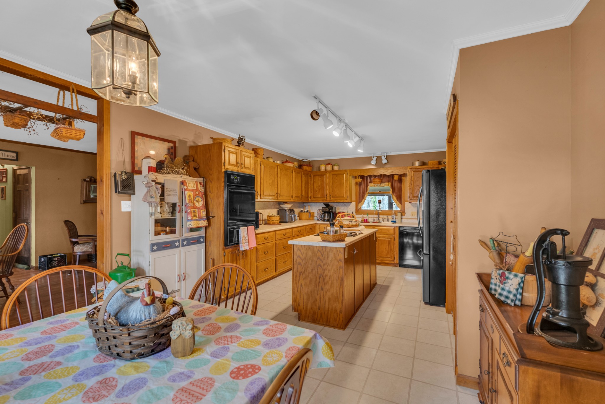 139 Bilbrey Road Livingston, TN 38570 - Photo 5 of 35 a living room with furniture a flat screen tv and a large window