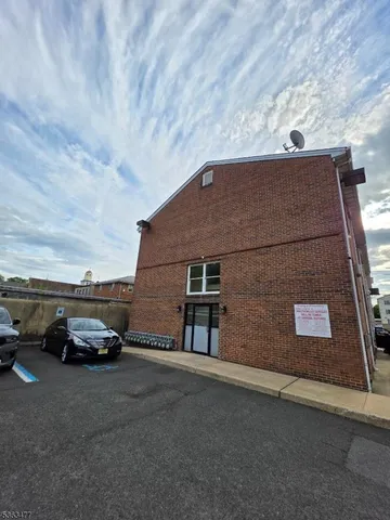 a car parked in front of a house