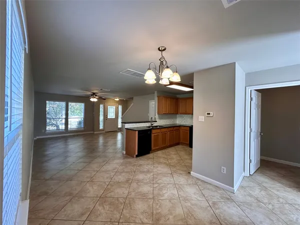 a view of a kitchen with a sink
