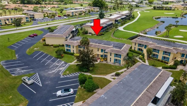 an aerial view of a house with a garden