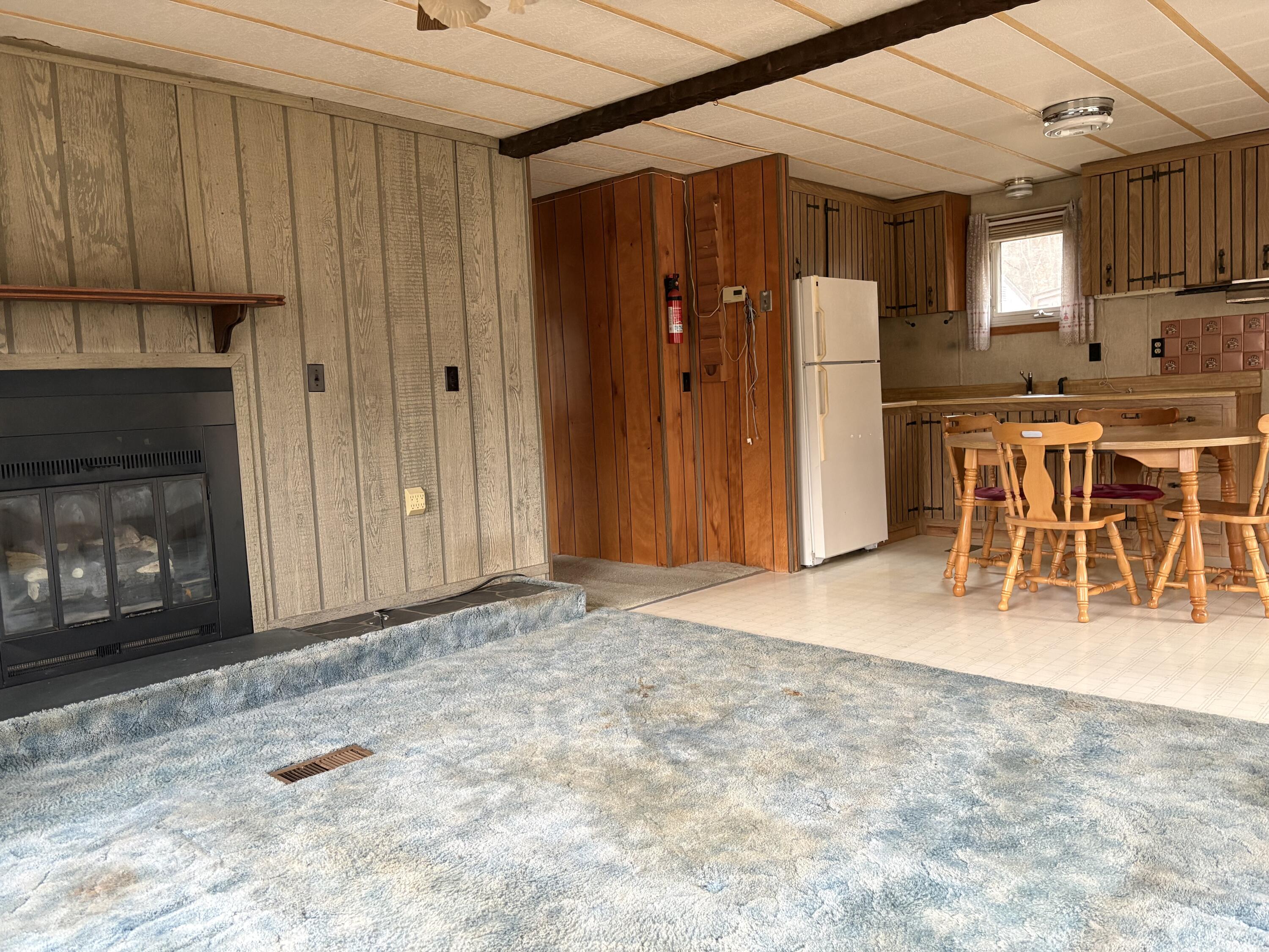 6701 Valley View Lane Hot Springs, VA 24445 - Photo 7 of 22 a view of a kitchen with a sink and a refrigerator