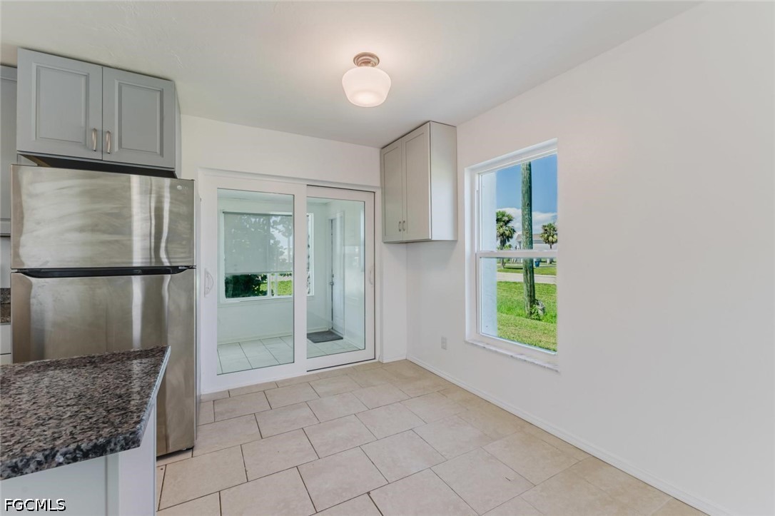 16595 Davis Road Fort Myers, FL 33908 - Photo 15 of 31 a view of an empty room with a window