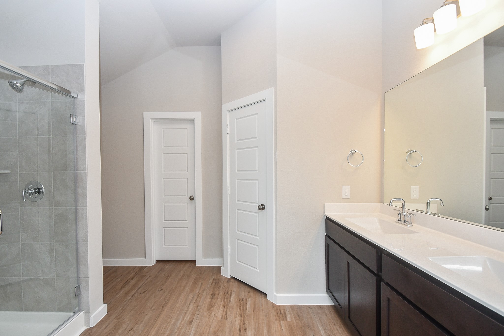 2007 Live Springs Way Rosenberg, TX 77471 - Photo 16 of 25 Primary bathroom-- double sinks and a large shower stall.