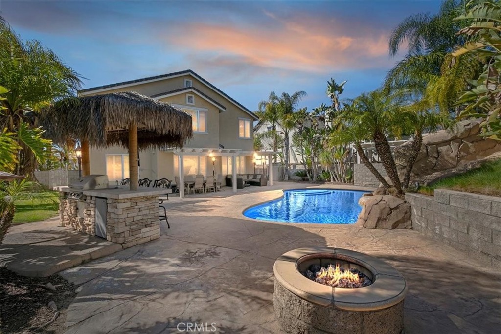 20664 Iris Canyon Road Riverside, CA 92508 - Photo 3 of 4 a view of a house with backyard and sitting area