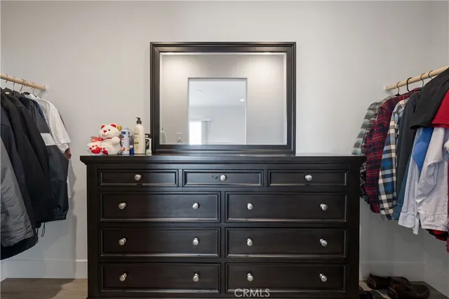 a view of a backyard with wooden fence