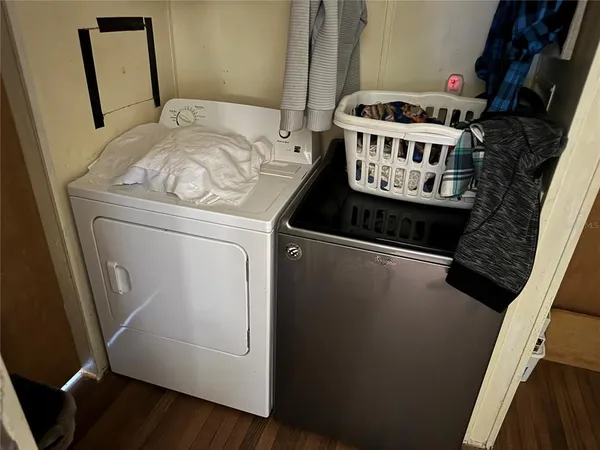 a utility room with dryer and washer