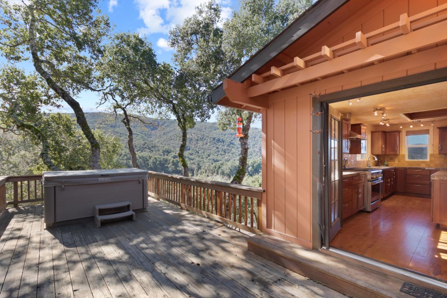 38025 Poppy Tree Lane Carmel Valley, CA 93924 - Photo 23 of 47 a view of backyard with outdoor seating and wooden fence