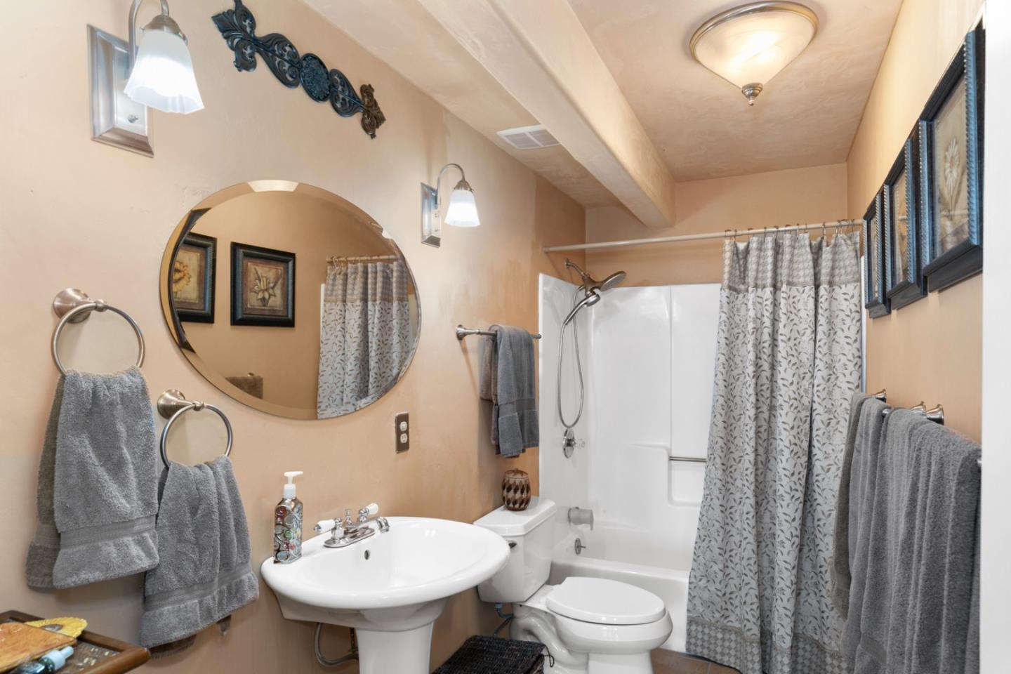 38025 Poppy Tree Lane Carmel Valley, CA 93924 - Photo 29 of 47 a bathroom with a toilet sink and mirror