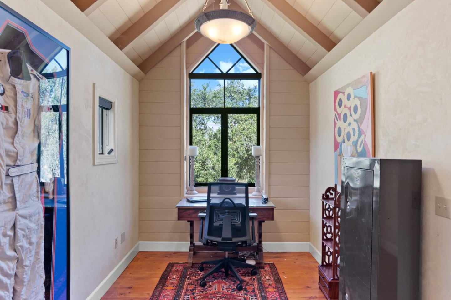 38025 Poppy Tree Lane Carmel Valley, CA 93924 - Photo 30 of 47 a view of a workspace with furniture and a window